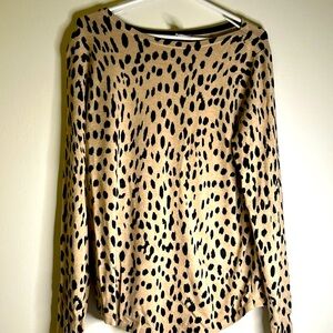 Chico’s animal print top size 1 long sleeves black cream 67% rayon 33% nylon
